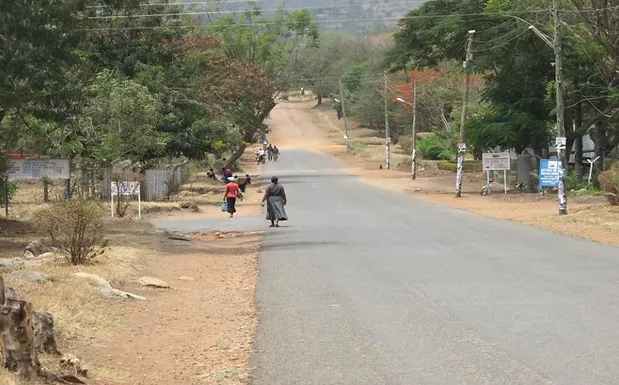 Sometimes people look at me curiously because I'm white, but sometimes I'm one of everyone and it's the best feeling to walk in a foreign country and feel at home. An Ugandan street