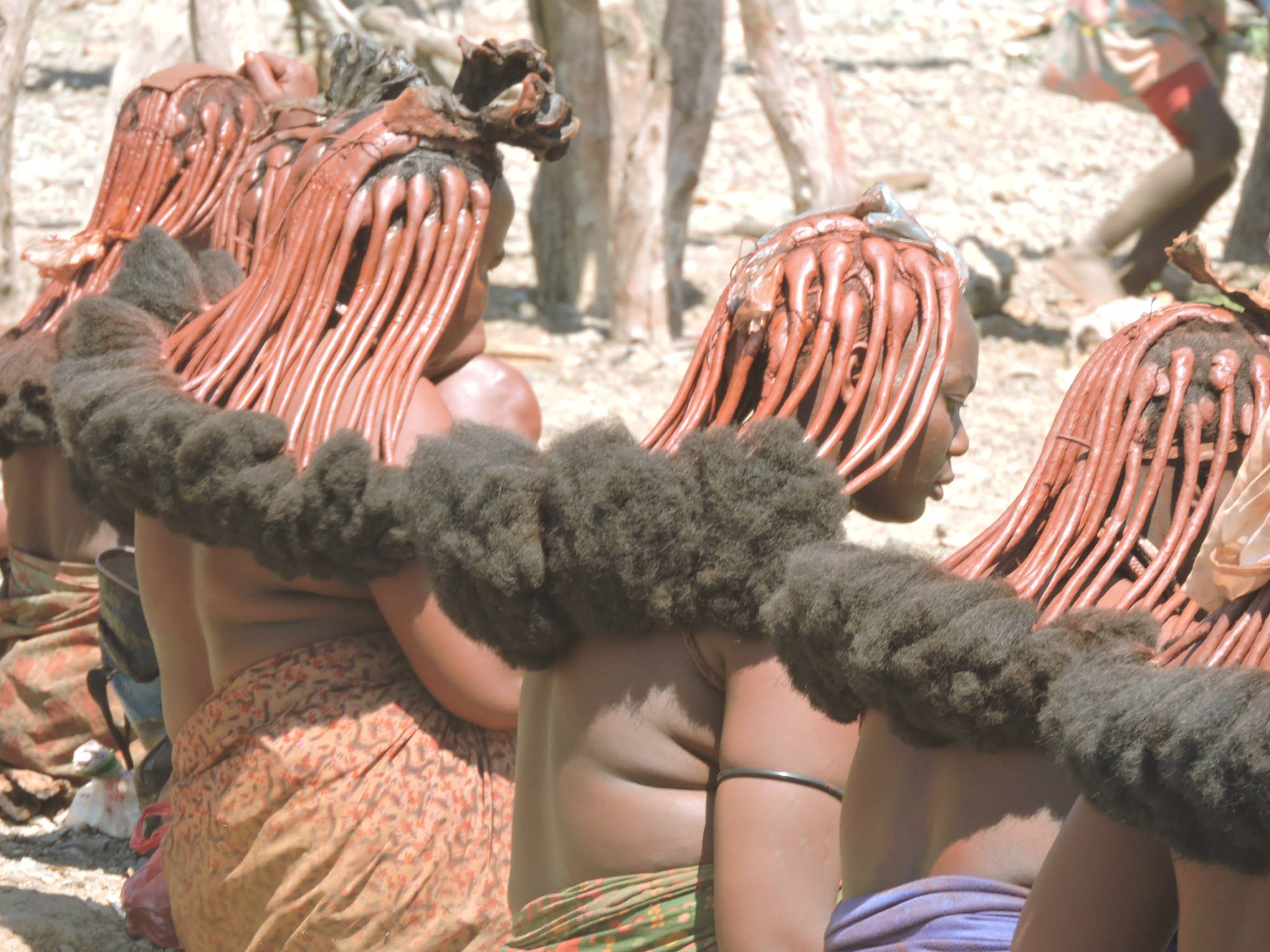 An authentic encounter. Their hair is coated in clay with wool extensions attached underneath. Photo: Gal Zanir