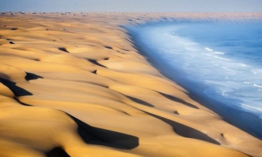 Giant dunes of the Namib meet the Atlantic Ocean